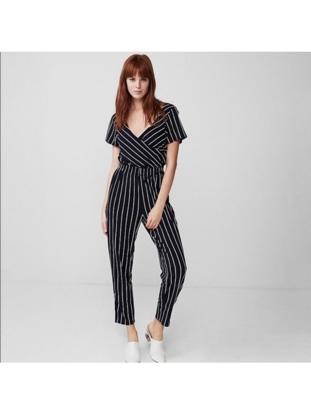 Express navy blue & white striped surplice jumpsuit S